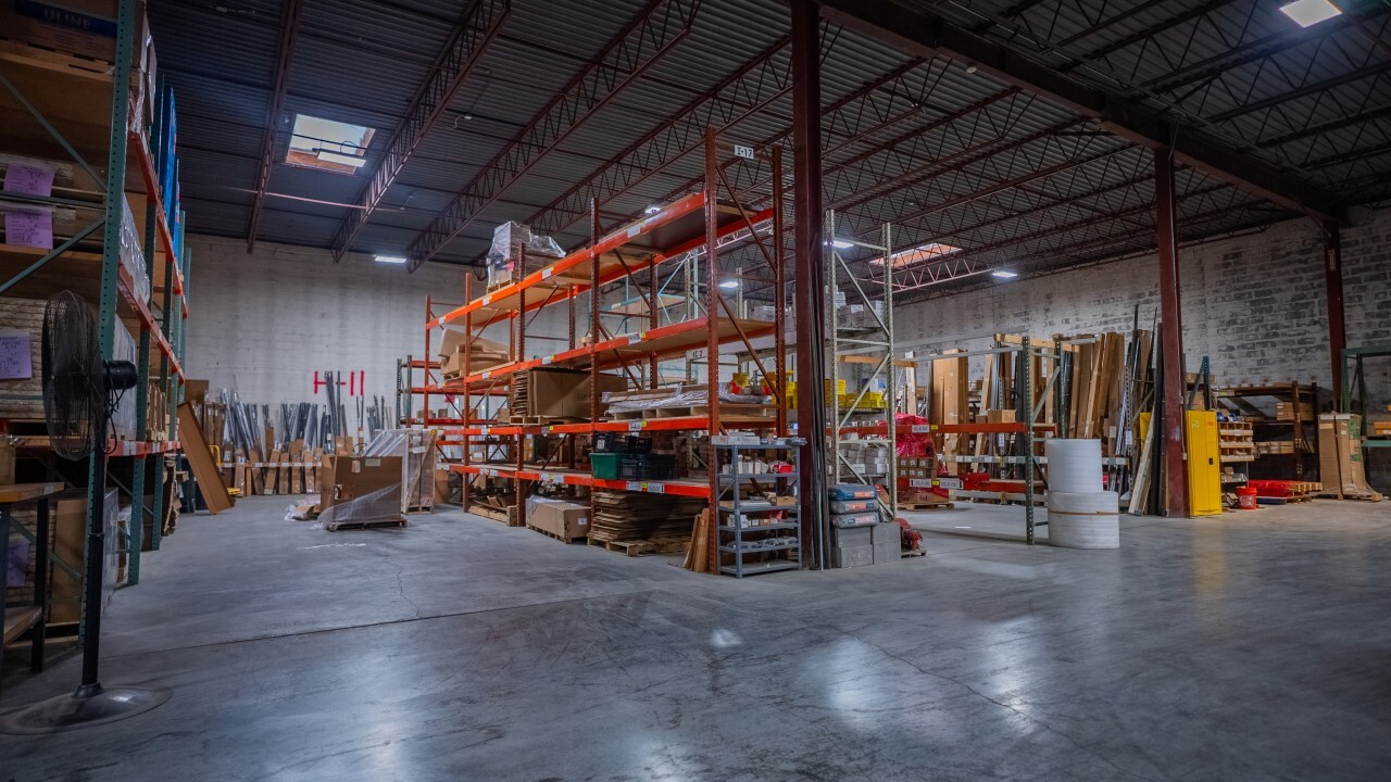Interior of a Kansas City industrial warehouse with pallet racking, open floor space and high clear ceiling height