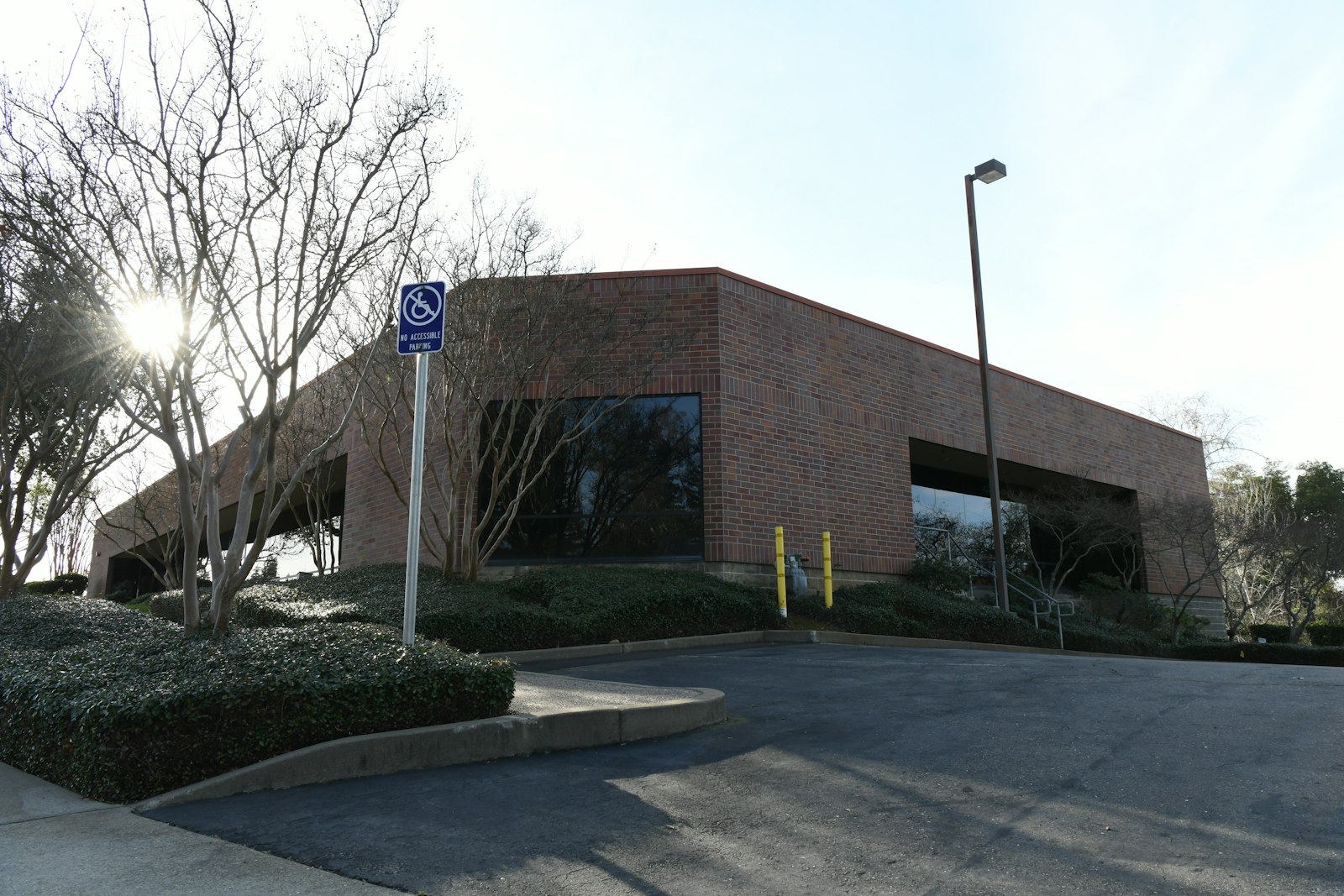 Brick low-rise office building on a sunny day, typical owner-occupied commercial real estate in Kansas City