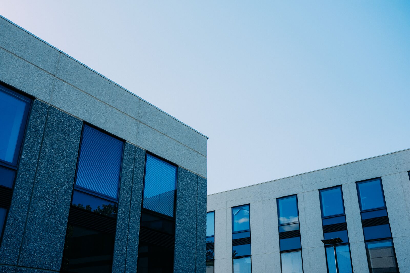 Exterior of modern Kansas City commercial office buildings, representing tenant improvements and commercial build-outs